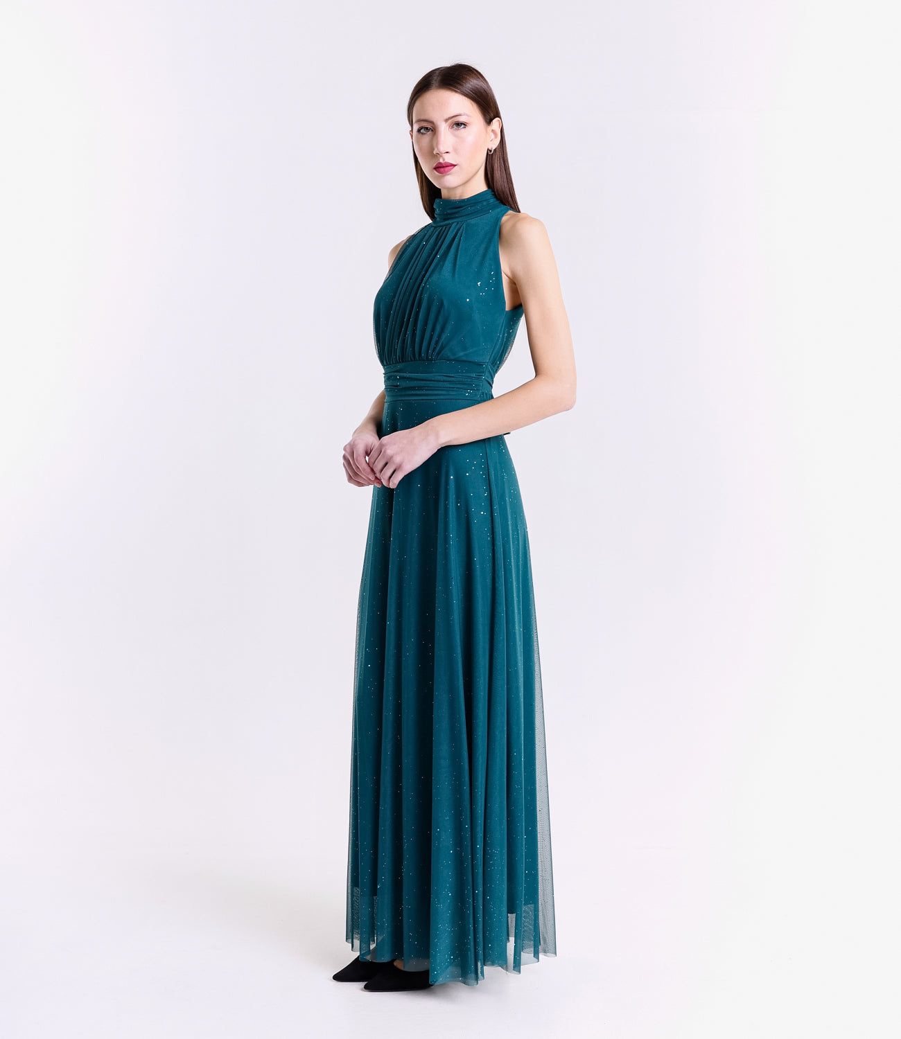 Lungo vestito ottanio con puzzo e legature laterali, design moderno per feste.