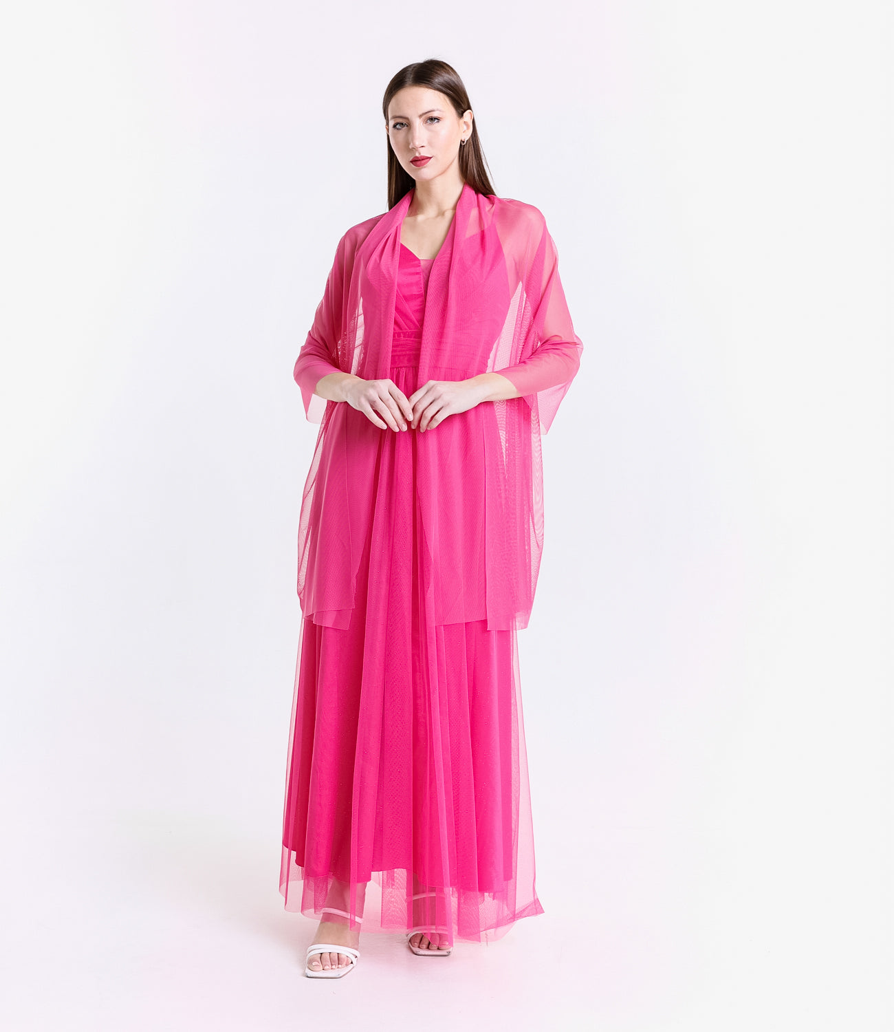 Abito formale fuxia con taglio drammatico, ideale per serate notturne