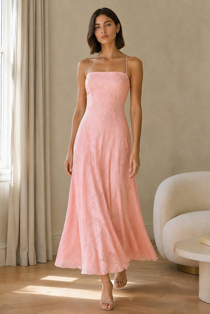 Abito midi elegante a spalline sottili con scollo a fascia, tessuto jacquard floreale e dettaglio a croce sul retro