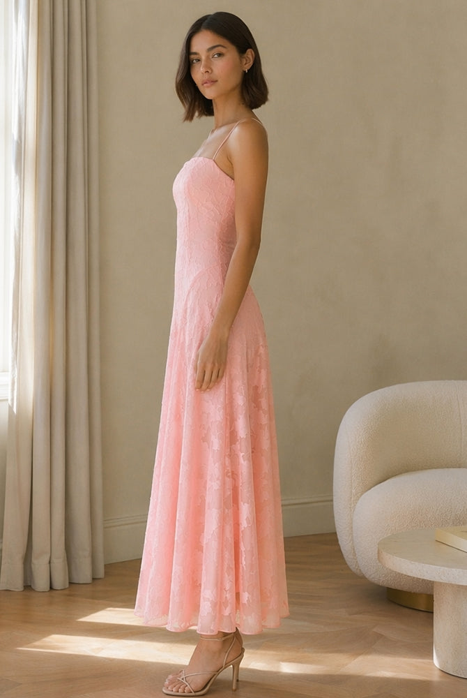 Abito midi elegante a spalline sottili con scollo a fascia, tessuto jacquard floreale e dettaglio a croce sul retro