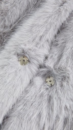 Giacca cropped in pelliccia sintetica con cappuccio ampio