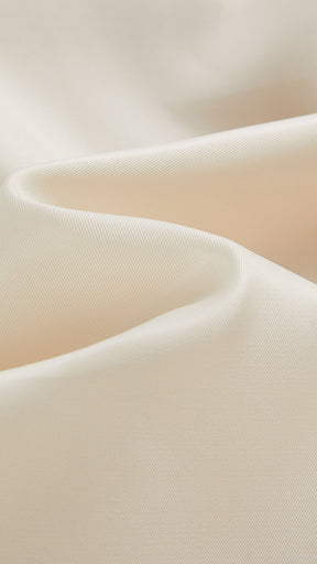 Cappotto corto in pelliccia sintetica con colletto a revers e cintura