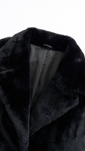 Cappotto medio in peluche sintetica con colletto a revers