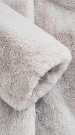Cappotto lungo in peluche sintetica con colletto a revers