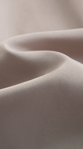 Cappotto corto in pelliccia sintetica a frange con cintura