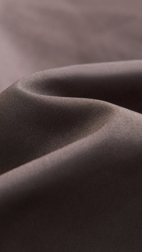 Cappotto corto in pelliccia sintetica a frange con cintura