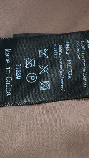 Giacca cropped in pelliccia sintetica con collo e zip frontale