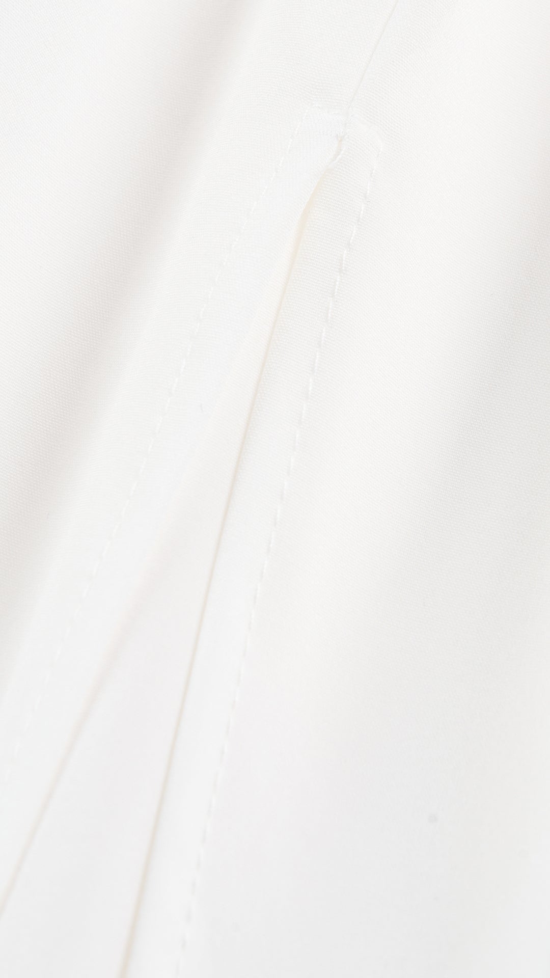 Abito lungo elegante con scollo a collo alto a fiocco, design bicolore con top asimmetrico e gonna fluida