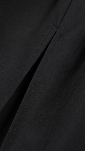 Abito lungo elegante con scollo a collo alto a fiocco, design bicolore con top asimmetrico e gonna fluida