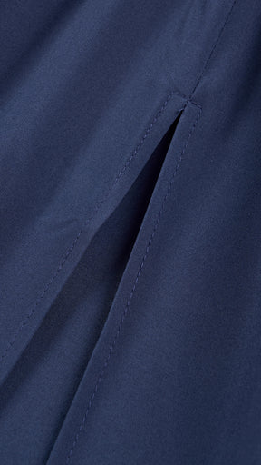 Abito lungo elegante con scollo a collo alto a fiocco, design bicolore con top asimmetrico e gonna fluida