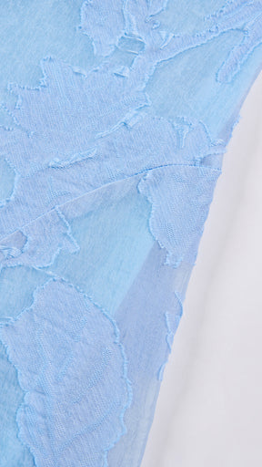 Abito midi elegante a spalline sottili con scollo a fascia, tessuto jacquard floreale e dettaglio a croce sul retro