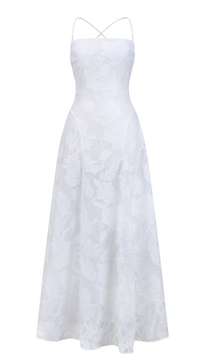 Abito midi elegante a spalline sottili con scollo a fascia, tessuto jacquard floreale e dettaglio a croce sul retro