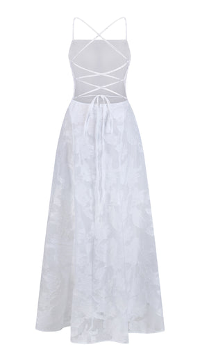 Abito midi elegante a spalline sottili con scollo a fascia, tessuto jacquard floreale e dettaglio a croce sul retro