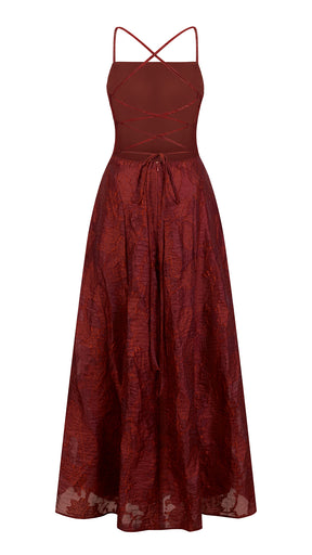 Abito midi elegante a spalline sottili con scollo a fascia, tessuto jacquard floreale e dettaglio a croce sul retro