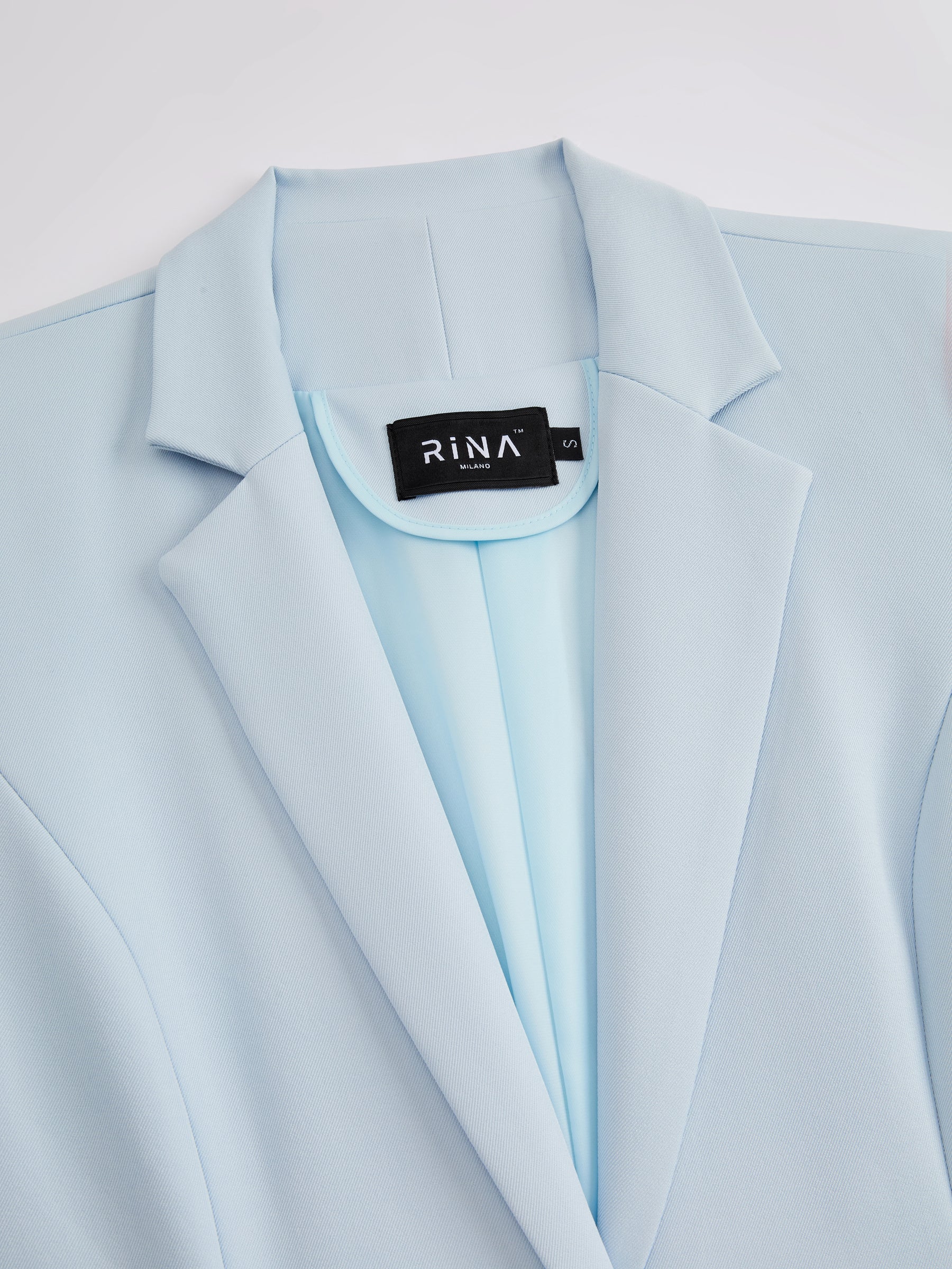 Blazer slim fit da donna: elegante blazer monopetto, adatto per l'ufficio e le occasioni formali.