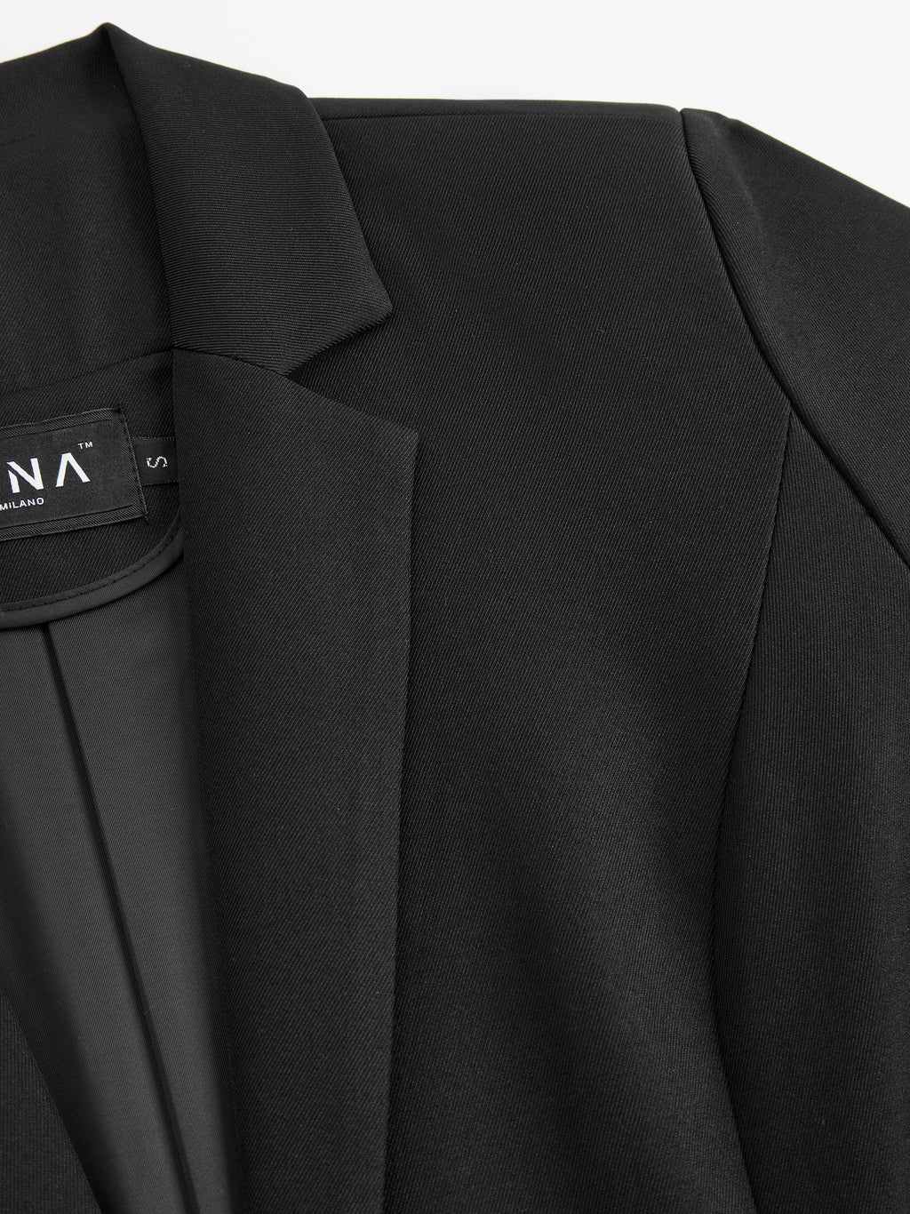 Blazer slim fit da donna: elegante blazer monopetto, adatto per l'ufficio e le occasioni formali.