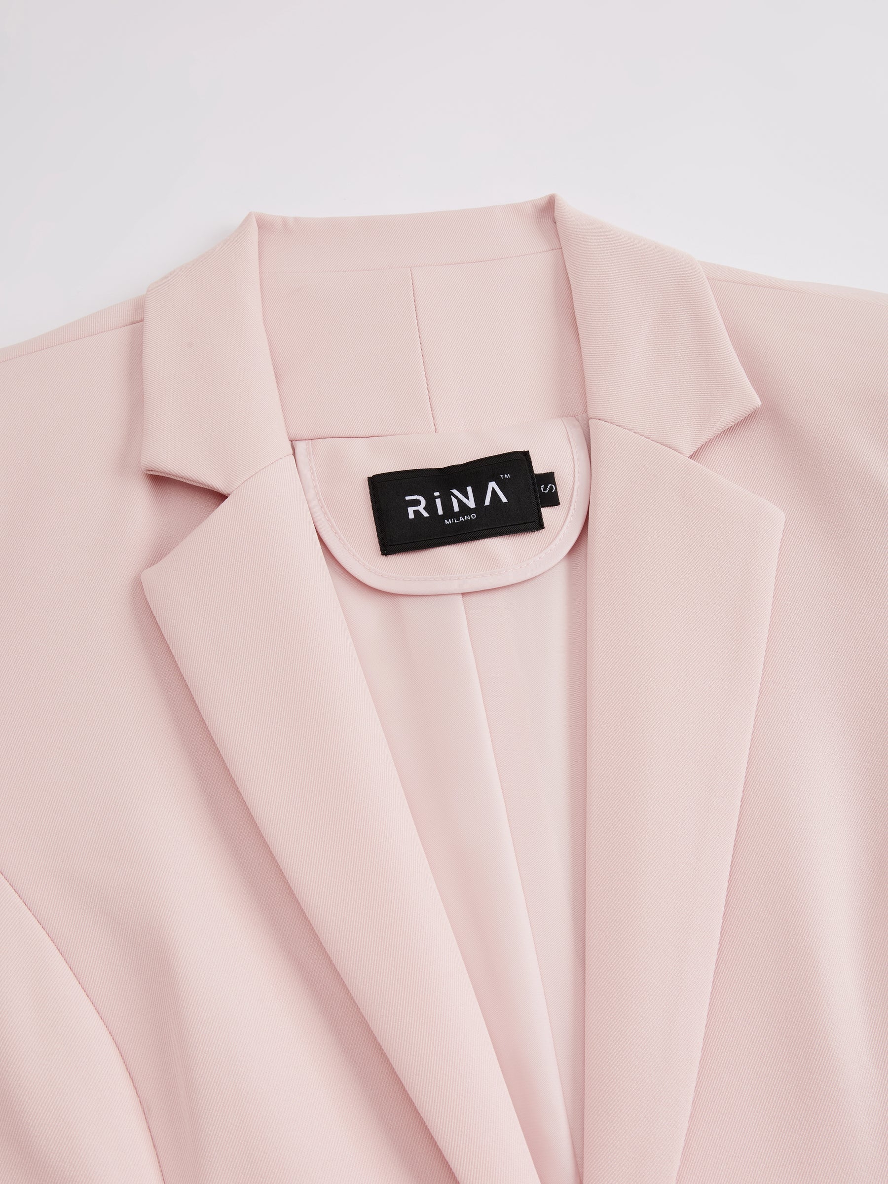 Blazer slim fit da donna: elegante blazer monopetto, adatto per l'ufficio e le occasioni formali.