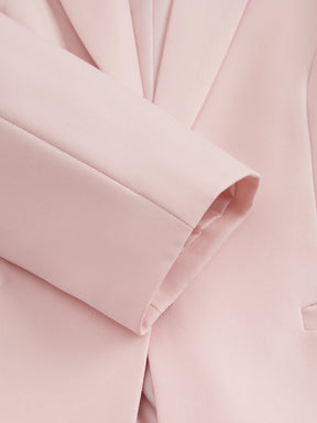 Blazer slim fit da donna: elegante blazer monopetto, adatto per l'ufficio e le occasioni formali.