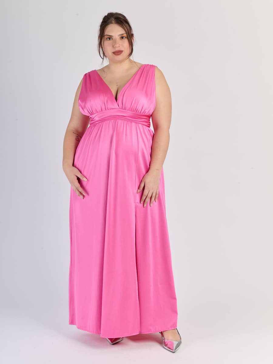 Abito Fuxia in tessuto scintillante senza maniche, scollo a V e vita decorativa, per uno stile vivace e seducente.