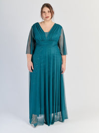 Abito da sera ottanio, stile avvolgente con scollatura a V e maniche semi - trasparenti.