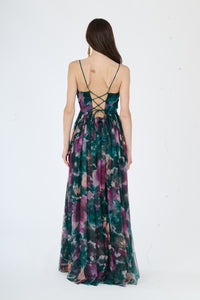 Abito da sera verde scuro, stile fluido con stampa colorata, spalline sottili e scollatura a V