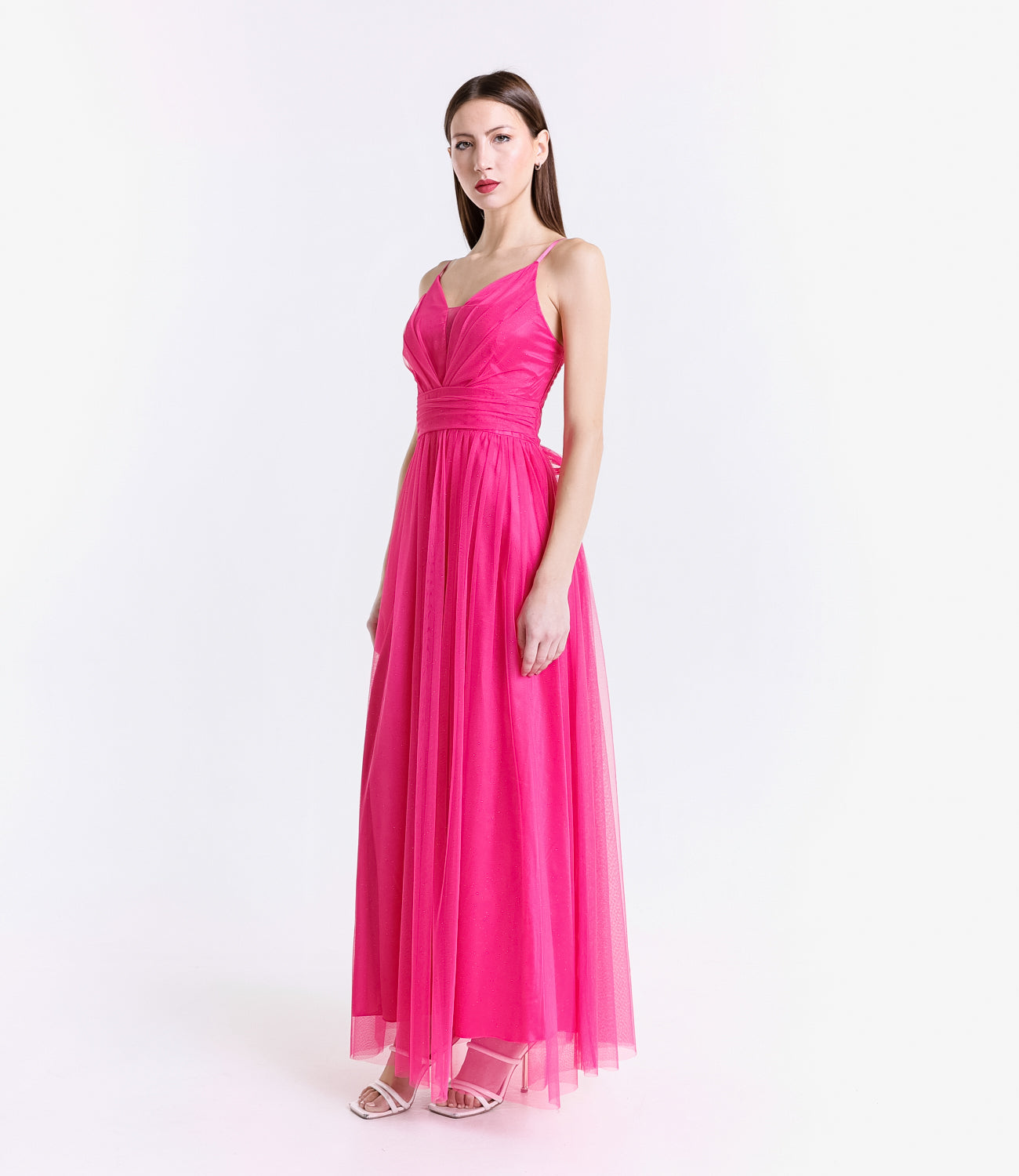 Abito elegante fuxia con falda ampia fluida, perfetto per eventi accattivanti