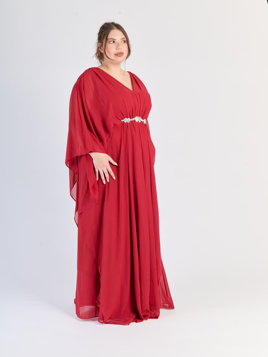 Abito lungo Bordo con maniche avvolgenti e struttura accattivante