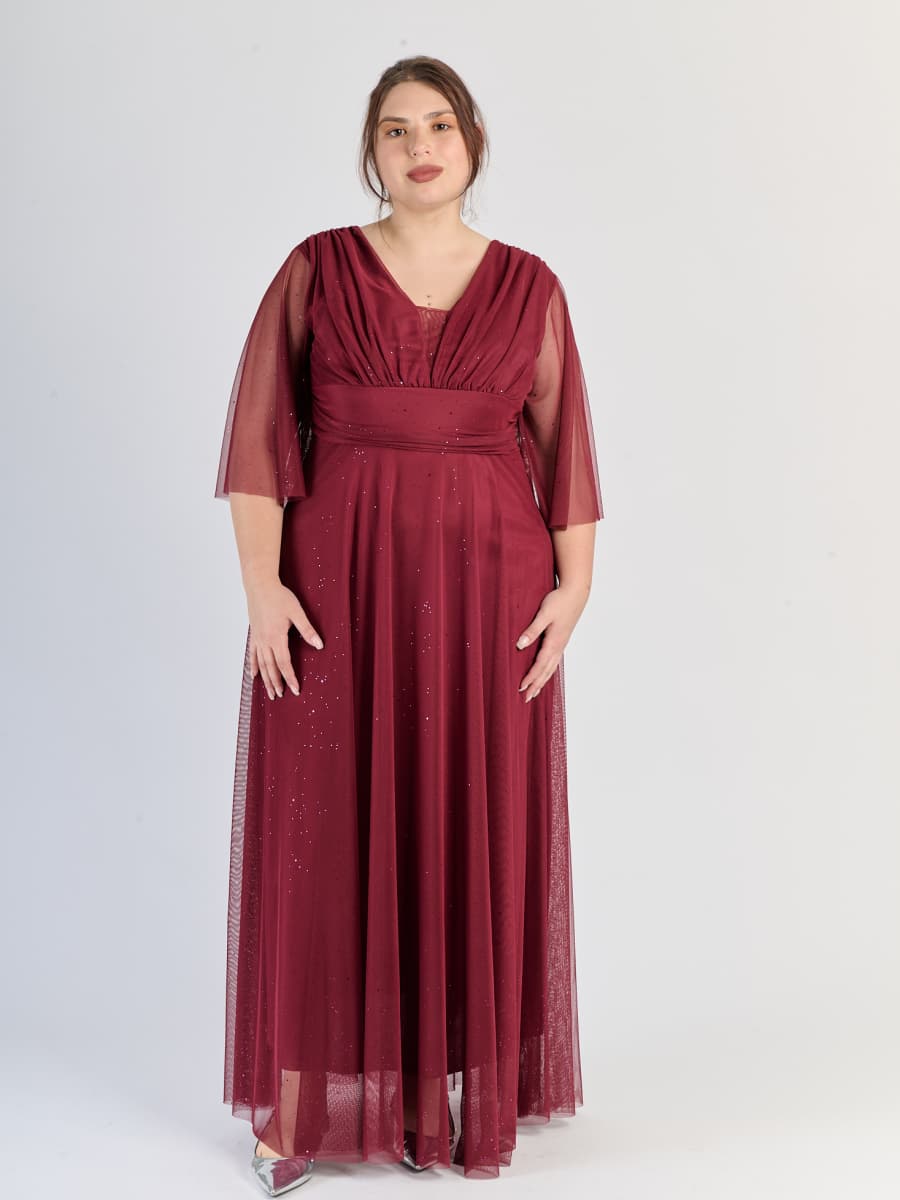 Abito lungo vino, scollatura a V e maniche trasparenti, un tocco di passione rossa.
