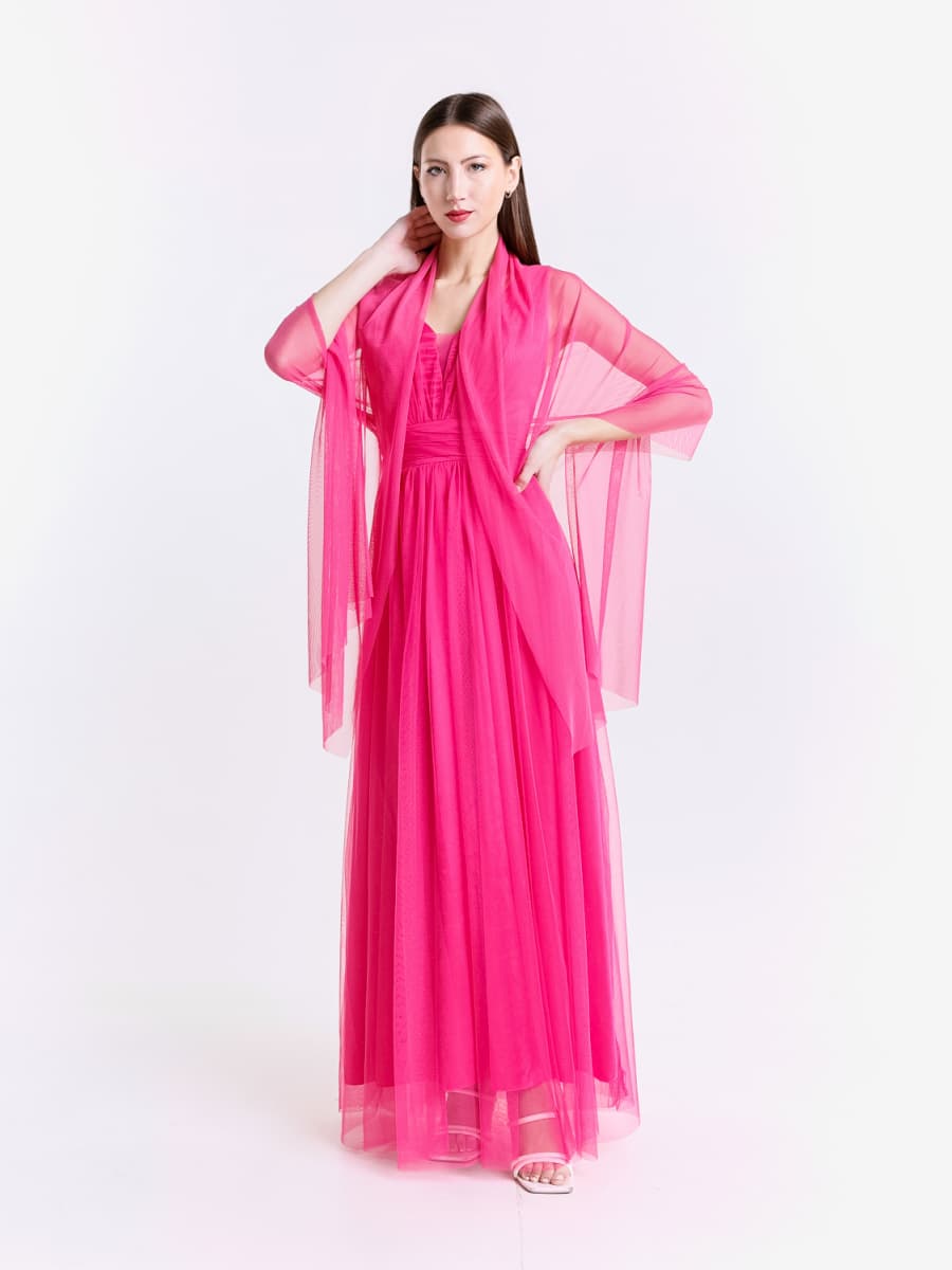 Completo abito lungo fuxia in tulle con mantello trasparente, colore audace