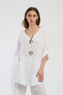 Completo bianco puro, top ampio con tasche e bottoni, freschezza per le giornate estive