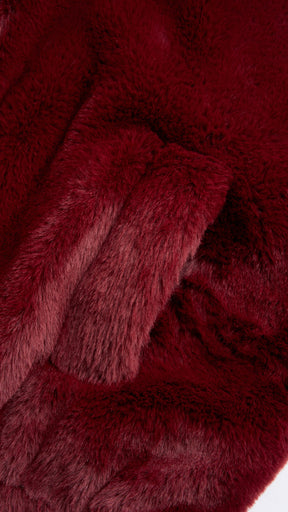 Giacca con cappuccio in peluche sintetica con zip e coulisse