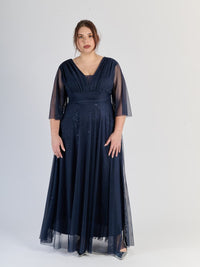 Lungo abito navy dal design classico, maniche trasparenti e scollatura a V, per eventi formali