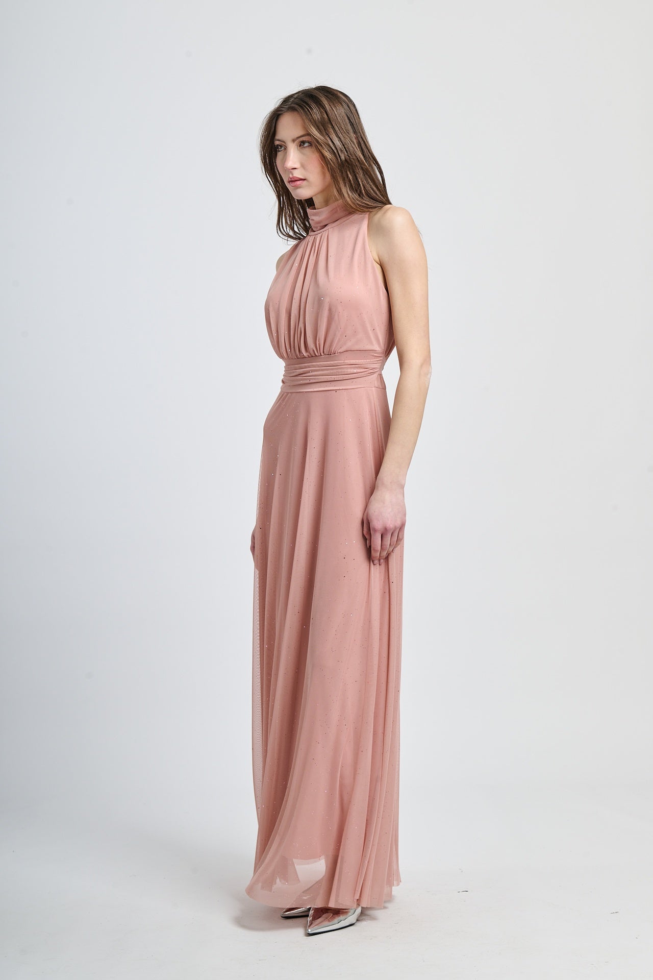 Vestito rosa antico con puzzo e frange posteriori, aspetto dolce per eventi.