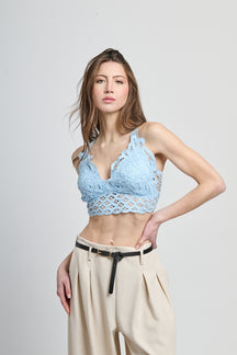 Top a uncinetto azzurro,collo a V e dettagli openwork