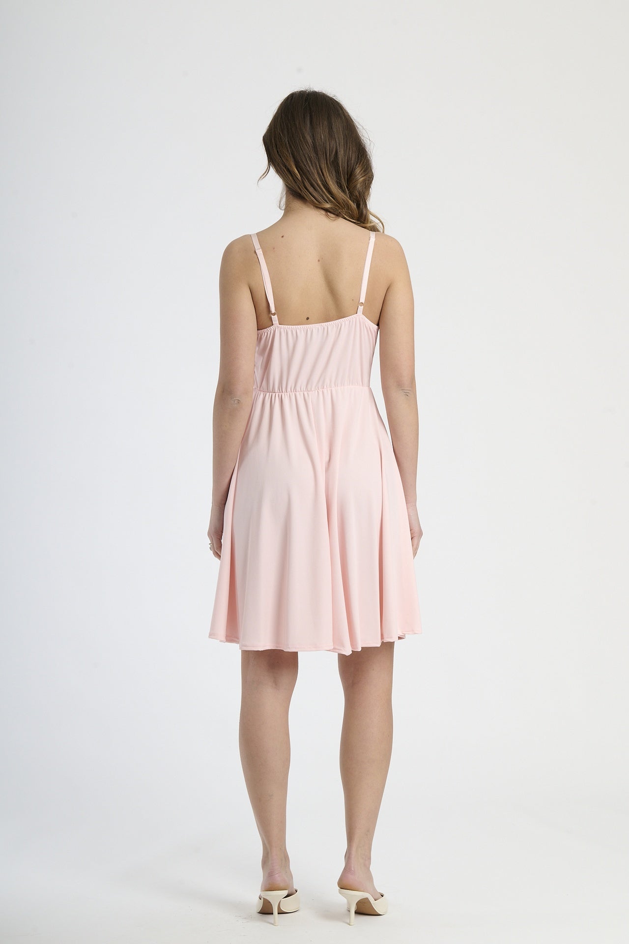 Vestito elegante rosa, silhouette slim con scollatura a V e fianchi svasati