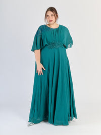 Abito formale plus size Verde.S con drappeggi delicati sul busto