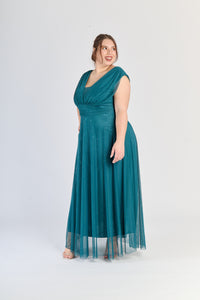 Abito ottanio elegante, maniche senza spalline e gonna midi, per serate particolari.