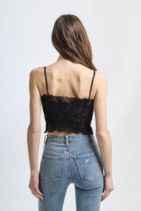 Top classico nero, ideale per abbinamenti versatili ed estivi.