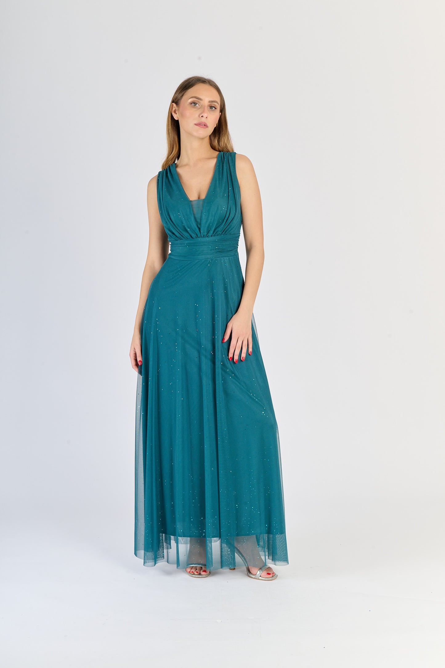 Abito ottanio da festa, silhouette avvolgente e colletto a V, fascinazione unica.