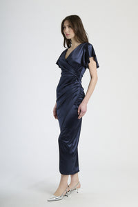 Abito navy in velluto con falda sfilata, abbigliamento versatile e di grande classe.