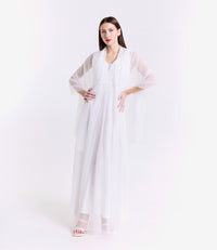 Abito da festa bianco in tulle, stile raffinato e eterno