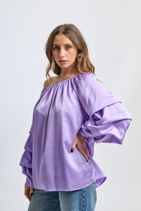 Outfit lilla: blusa oversize, dettagli ruffle, per occasioni informali o eventi leggeri