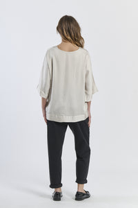 Tunica beige in tessuto caldo