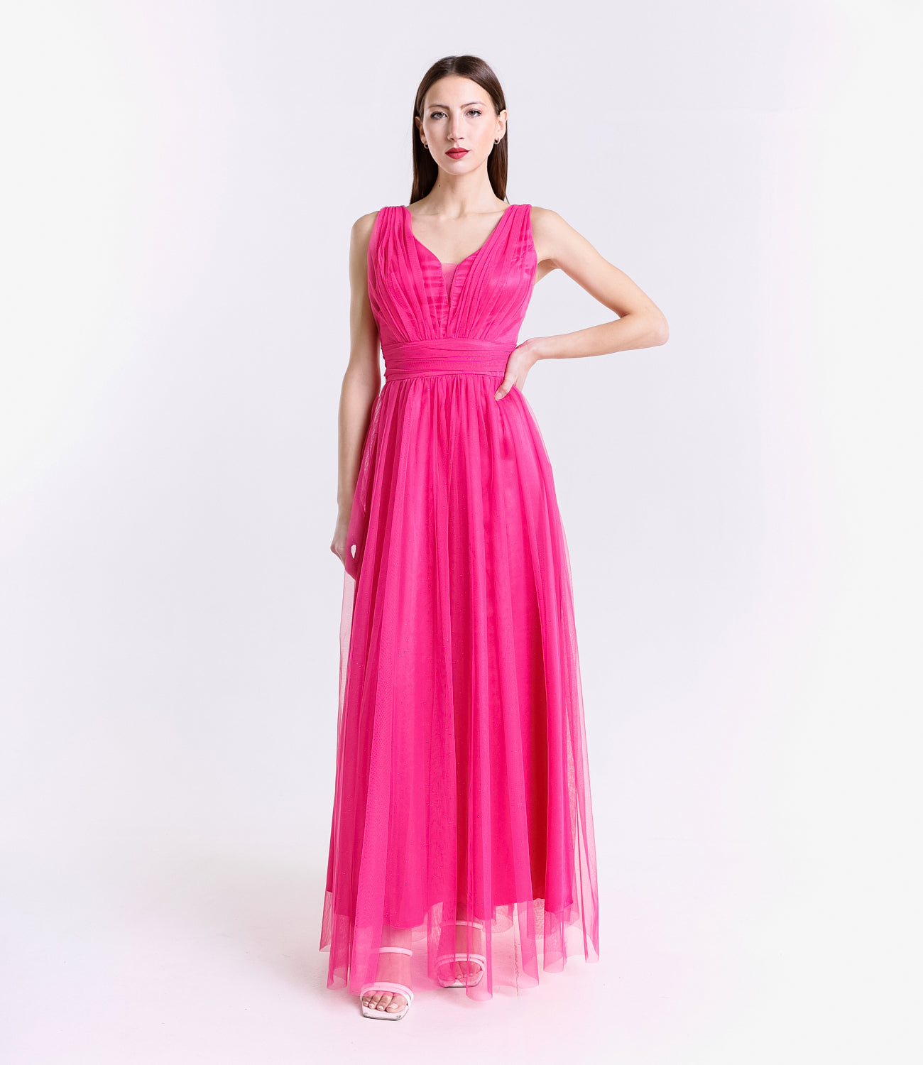 Abito da festa fuxia in tulle, vivace e dal grande impatto visivo