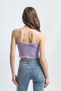 Top delicato lilla, ideale per look estivi e occasioni romantiche.