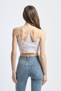 Canotta in pizzo bianco, taglio cropped e design senza spalline