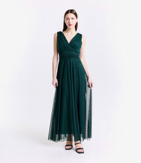 Abito lungo verde scuro senza spalline,elegante e rassicurante