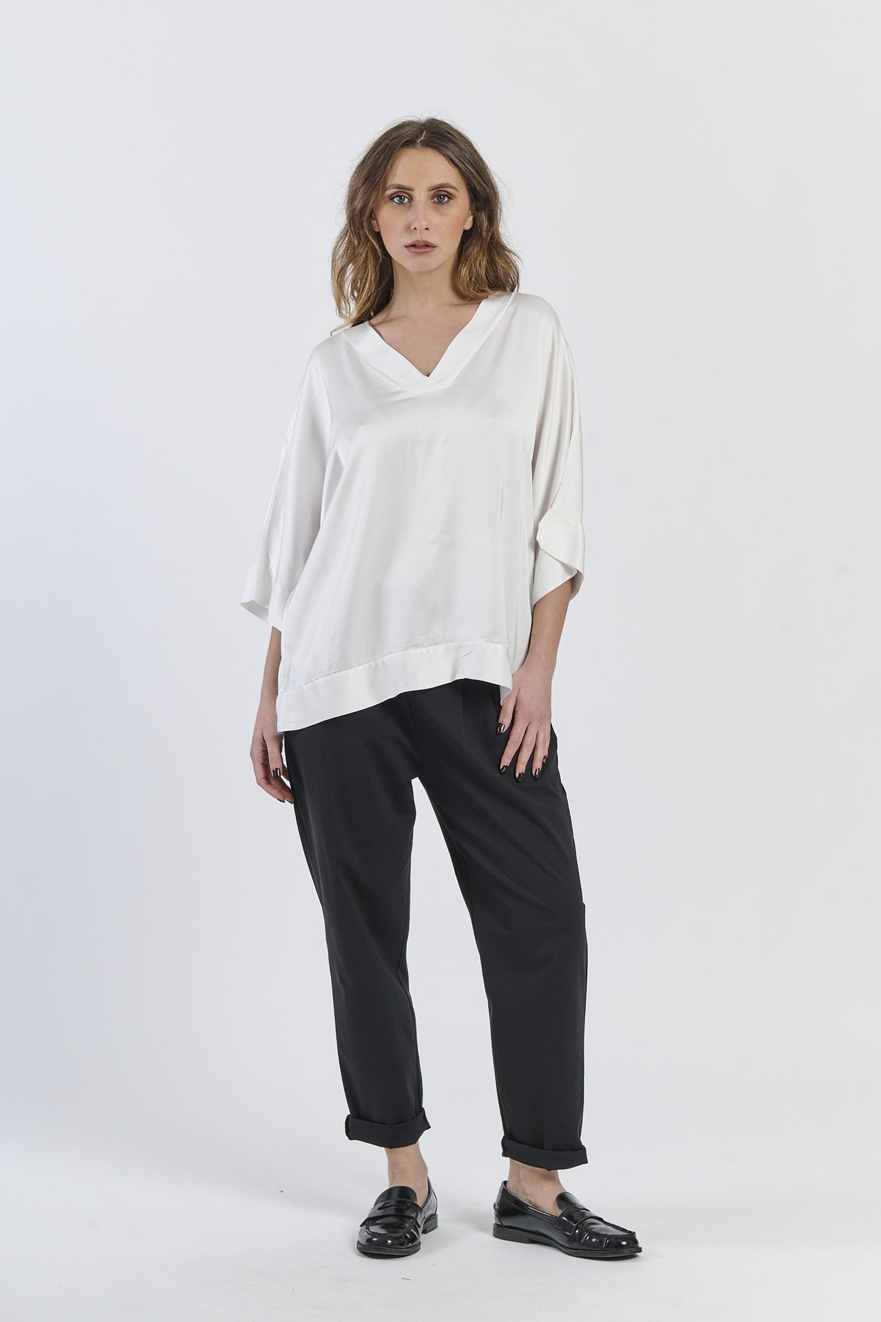 Tunica bianca in tessuto trasparente