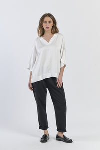 Tunica bianca in tessuto trasparente